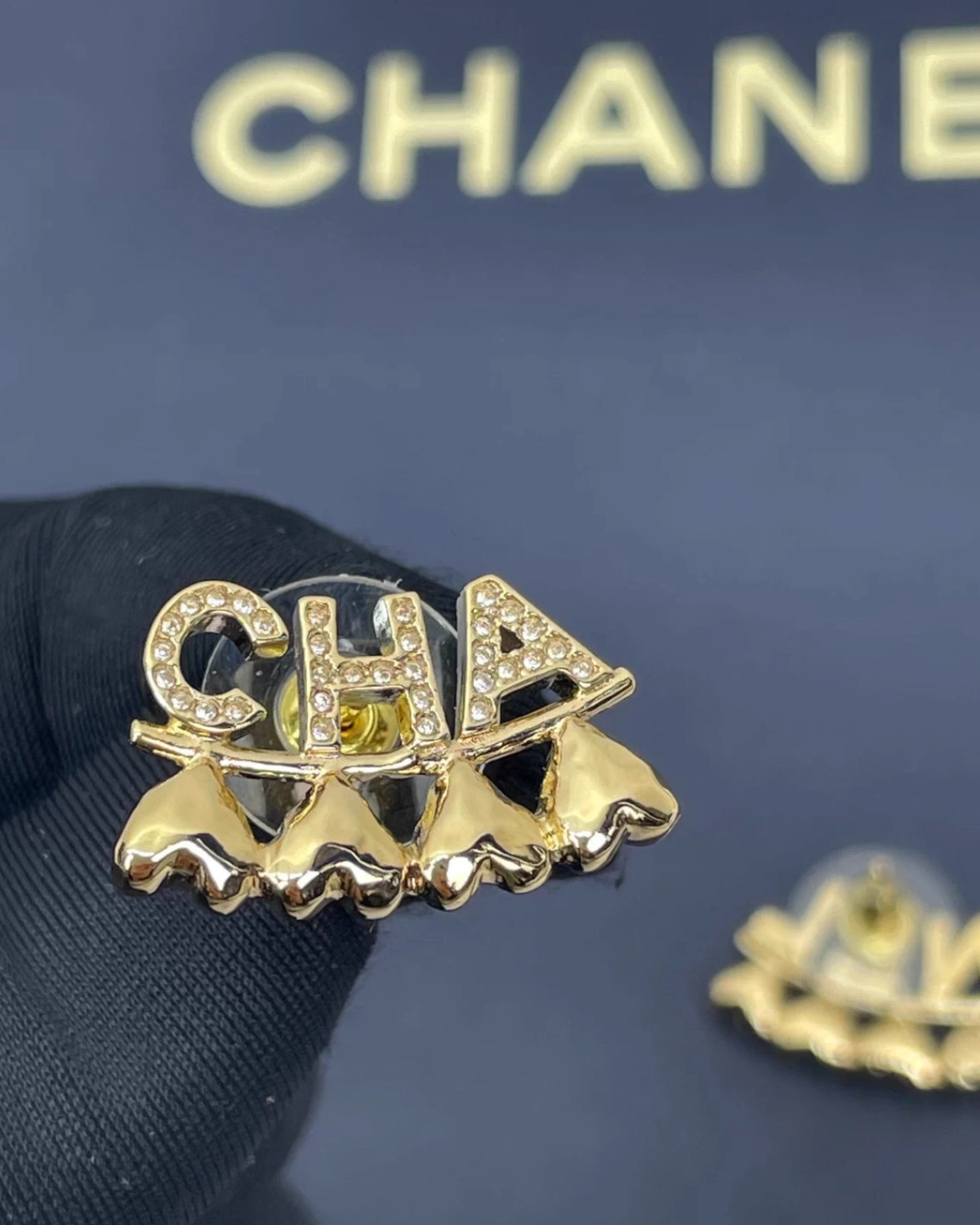 Chanel 23P Gold Crystal Cha-Nel Earrings