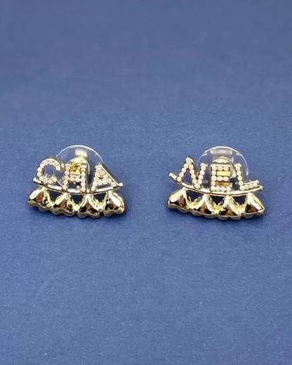 Chanel 23P Gold Crystal Cha-Nel Earrings