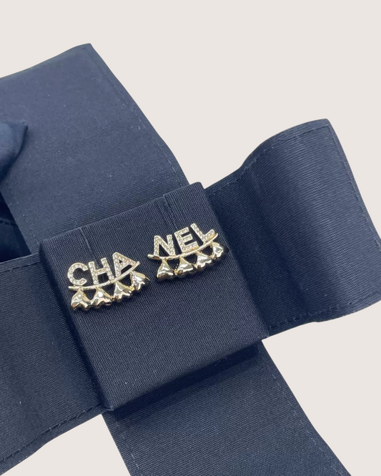 Chanel 23P Gold Crystal Cha-Nel Earrings
