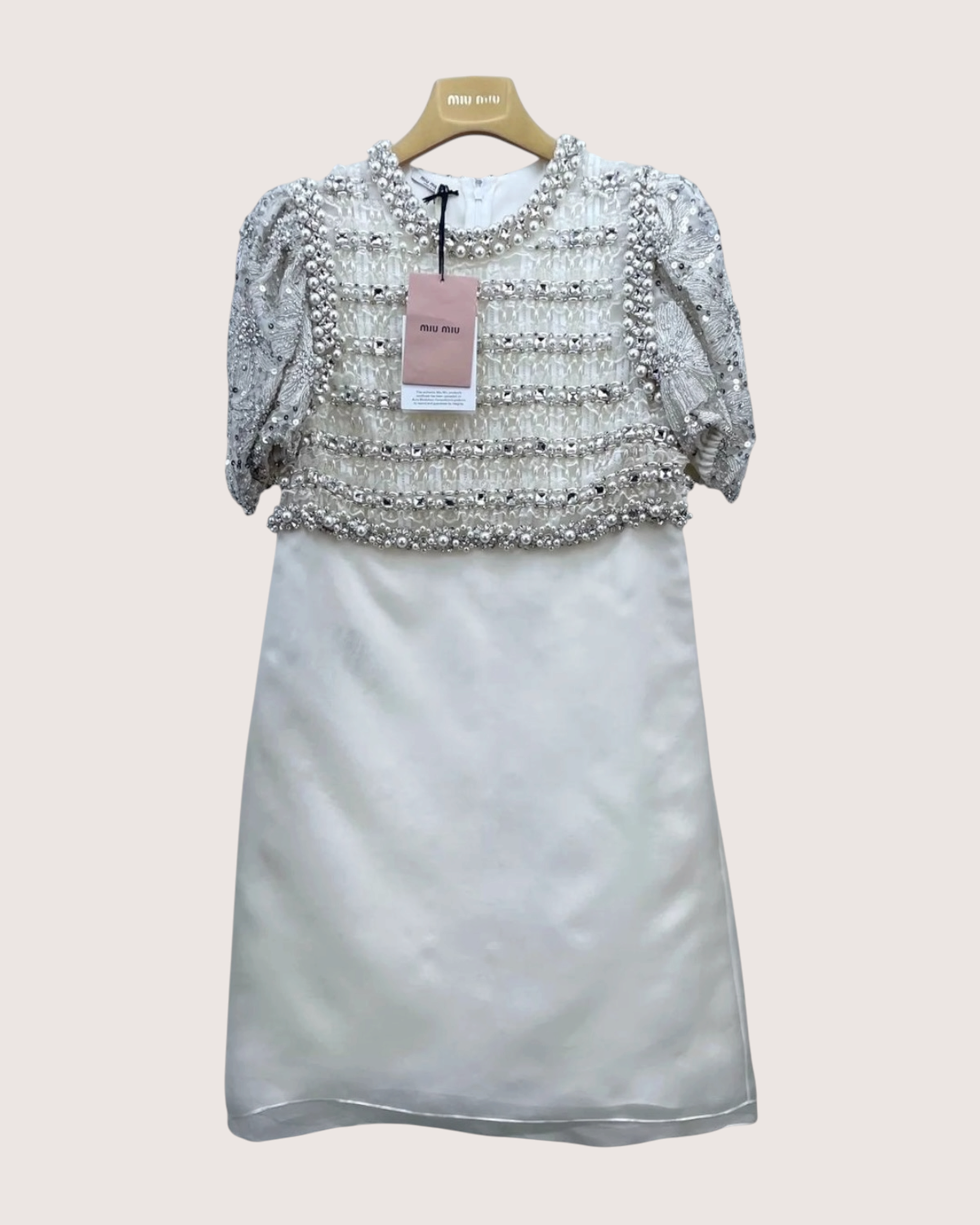 miu miu mini dress It has a pleated skirt and is lined with 100% viscose Miu Miu Embellished Mini Dress
