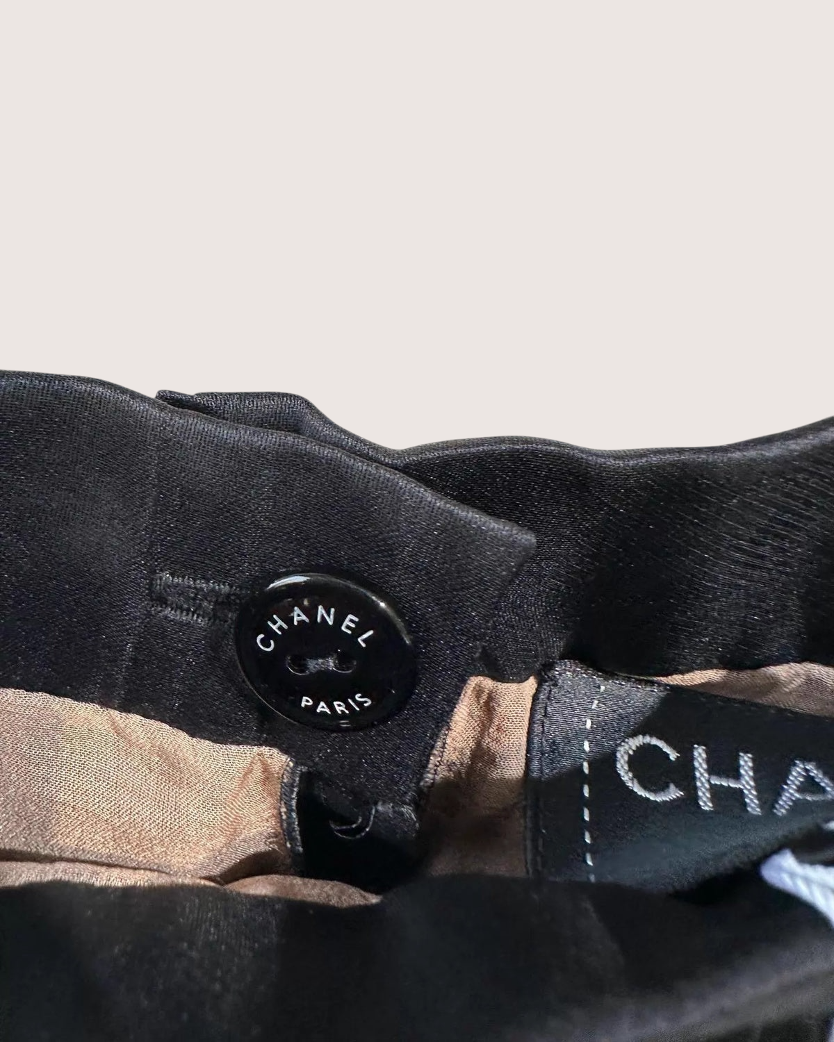 Chanel 22A Pleated Pearl CC Logo Mini Skirt