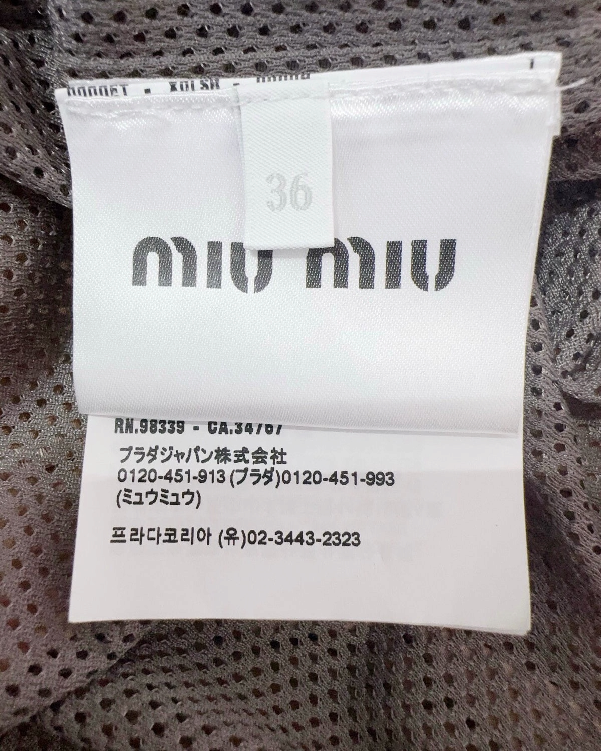 Miu Miu Logo Zip-Pocket Shorts Brown, Grey IT 36
